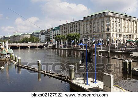 Commercial buildings on the corner of the Town Hall Market square and Jungfernstieg in Hamburg with the small Alster Lake, Hamburg, Germany, Europe View Large Photo Image Stock Image - Commercial buildings on the corner of the Town Hall Market square and Jungfernstieg in Hamburg with the small Alster Lake, Hamburg, Germany, Europe. Fotosearch