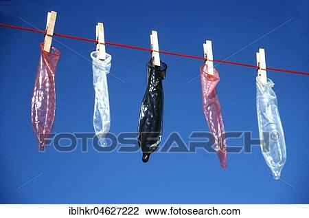 Stock Image - Condoms on the clothesline, Berlin, Germany, Europe. Fotosearch