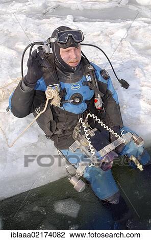 Diver, preparing for subglacial diving, ice diving, in the frozen Black Sea, a rare phenomenon, last time it occured in 1977, Odessa, Ukraine, Eastern Europe, Europe View Large Photo Image Stock Image - Diver, preparing for subglacial diving, ice diving, in the frozen Black Sea, a rare phenomenon, last time it occured in 1977, Odessa, Ukraine, Eastern Europe, Europe. Fotosearch