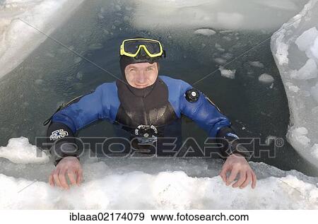 Diver, preparing for subglacial diving, ice diving, in the frozen Black Sea, a rare phenomenon, last time it occured in 1977, Odessa, Ukraine, Eastern Europe, Europe View Large Photo Image Stock Photo - Diver, preparing for subglacial diving, ice diving, in the frozen Black Sea, a rare phenomenon, last time it occured in 1977, Odessa, Ukraine, Eastern Europe, Europe. Fotosearch