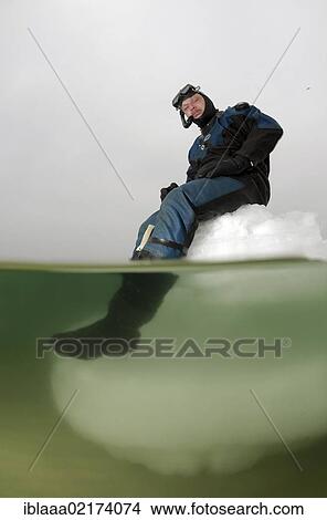 Diver, subglacial diving, ice diving, in the frozen Black Sea, a rare phenomenon, last time it occured in 1977, Odessa, Ukraine, Eastern Europe, Europe View Large Photo Image Picture - Diver, subglacial diving, ice diving, in the frozen Black Sea, a rare phenomenon, last time it occured in 1977, Odessa, Ukraine, Eastern Europe, Europe. Fotosearch