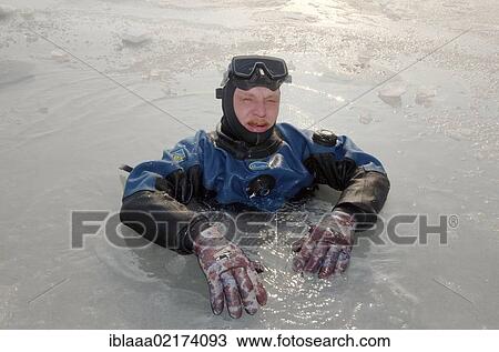 Diver, subglacial diving, ice diving, in the frozen Black Sea, a rare phenomenon, last time it occured in 1977, Odessa, Ukraine, Eastern Europe, Europe View Large Photo Image Stock Image - Diver, subglacial diving, ice diving, in the frozen Black Sea, a rare phenomenon, last time it occured in 1977, Odessa, Ukraine, Eastern Europe, Europe. Fotosearch