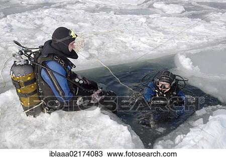 Divers, preparing for subglacial diving, ice diving, in the frozen Black Sea, a rare phenomenon, last time it occured in 1977, Odessa, Ukraine, Eastern Europe, Europe View Large Photo Image Stock Image - Divers, preparing for subglacial diving, ice diving, in the frozen Black Sea, a rare phenomenon, last time it occured in 1977, Odessa, Ukraine, Eastern Europe, Europe. Fotosearch