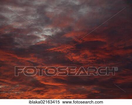 Stock Photography - Evening sky with glowing clouds. Fotosearch