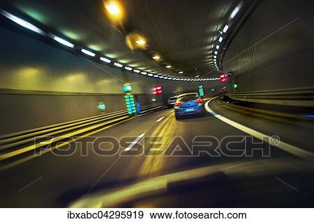Stock Photo - Fahrende Autos im Luise-Kiesselbach-Tunnel, Munchen, Bayern, Deutschland, Europa. Fotosearch