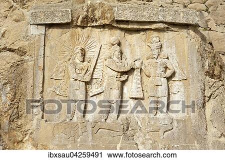 Felsrelief der Sassaniden, Kronungszeremonie, Investitur, Gott Mithras, persischer Herrscher Konig Ardaschir II., zoroastischer Gott Ahura Mazda, Taq-e Bostan, Kermanshah, Iran View Large Photo Image Stock Image - Felsrelief der Sassaniden, Kronungszeremonie, Investitur, Gott Mithras, persischer Herrscher Konig Ardaschir II., zoroastischer Gott Ahura Mazda, Taq-e Bostan, Kermanshah, Iran. Fotosearch