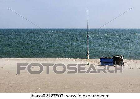 Stock Photo - Fishing rod at Hoernum Odde, Hoernum, Sylt, North Frisia, Schleswig-Holstein, Germany, Europe. Fotosearch