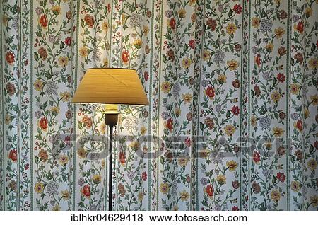 Floor lamp in front of curtain with flower pattern, Berlin, Germany, Europe View Large Photo Image Stock Photo - Floor lamp in front of curtain with flower pattern, Berlin, Germany, Europe. Fotosearch