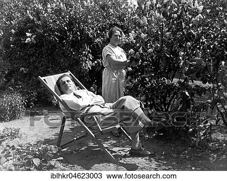 Garden, relaxing in deck chair, ca. 1930, exact location unknown, Germany, Europe View Large Photo Image Stock Image - Garden, relaxing in deck chair, ca. 1930, exact location unknown, Germany, Europe. Fotosearch