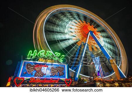 Gingerbread hearts stall with ferris wheel at night, Oktoberfest, Theresienwiese, Munich, Upper Bavaria, Germany, Europe View Large Photo Image Stock Photograph - Gingerbread hearts stall with ferris wheel at night, Oktoberfest, Theresienwiese, Munich, Upper Bavaria, Germany, Europe. Fotosearch
