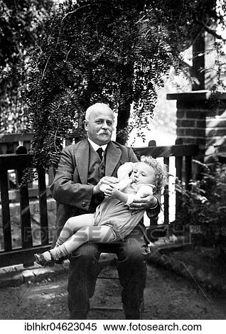 Grandpa gives bottles ca. 1926, exact place unknown, Germany, Europe View Large Photo Image Stock Photography - Grandpa gives bottles ca. 1926, exact place unknown, Germany, Europe. Fotosearch