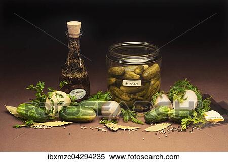 Gurken, Zwiebeln, Gewurze in einem Glas View Large Photo Image Stock Photography - Gurken, Zwiebeln, Gewurze in einem Glas. Fotosearch