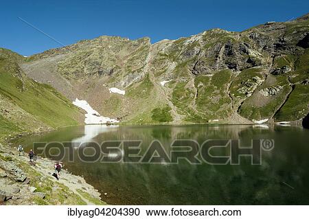 Stock Image - Hicking, Oncet Lake, Pic Du Midi De Bigorre, Hautes Pyrenees, France. Fotosearch