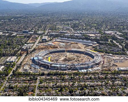 Huge construction site, office building Apple Campus II or Apple Campus 2 or AC2, architect Norman Foster, Cupertino, Silicon Valley, California, USA, North America View Large Photo Image Stock Photo - Huge construction site, office building Apple Campus II or Apple Campus 2 or AC2, architect Norman Foster, Cupertino, Silicon Valley, California, USA, North America. Fotosearch