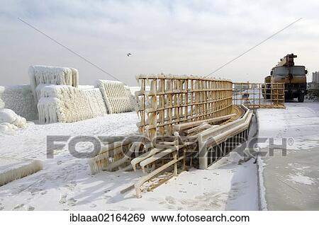 Icy pier, frozen Black Sea, a rare phenomenon, last time it occured in 1977, Odessa, Ukraine, Eastern Europe, Europe View Large Photo Image Stock Photo - Icy pier, frozen Black Sea, a rare phenomenon, last time it occured in 1977, Odessa, Ukraine, Eastern Europe, Europe. Fotosearch