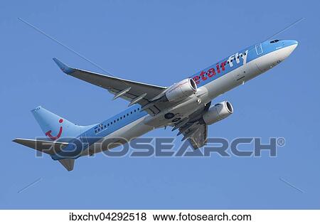 Jetair Fly, Flugzeug, im Flug, blauer Himmel View Large Photo Image Stock Photo - Jetair Fly, Flugzeug, im Flug, blauer Himmel. Fotosearch