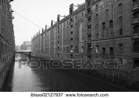 Stock Photo - Kehrwiederfleet canal in the Speicherstadt historic warehouse district, Hamburg, Germany, Europe. Fotosearch