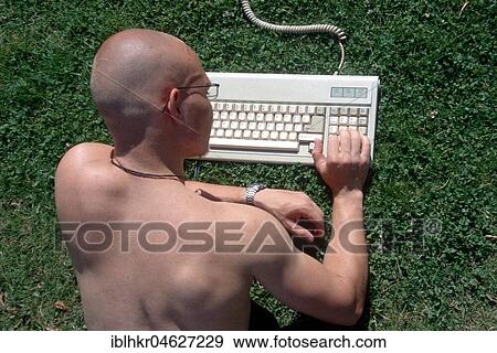 Stock Photo - Keyboard on the meadow, Berlin, Germany, Europe. Fotosearch