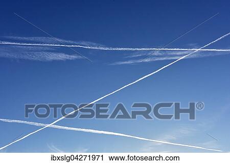 Kondensstreifen von Flugzeugen am Himmel, Bayern, Deutschland, Europa View Large Photo Image Stock Image - Kondensstreifen von Flugzeugen am Himmel, Bayern, Deutschland, Europa. Fotosearch