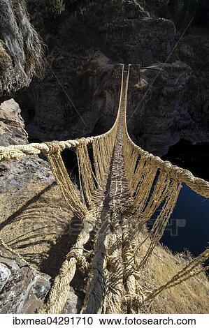 Letzte funktionierende Inka Hangebrucke Qu'eswachaka, Seilbrucke aus geflochtenem Ichu-Gras (Jarava ichu) uber den Fluss Apurimac, Peru, Sudamerika View Large Photo Image Stock Image - Letzte funktionierende Inka Hangebrucke Qu'eswachaka, Seilbrucke aus geflochtenem Ichu-Gras (Jarava ichu) uber den Fluss Apurimac, Peru, Sudamerika. Fotosearch