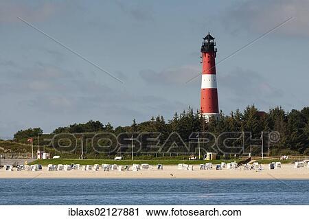 Stock Image - Lighthouse of Hoernum with a sandy beach, seen from the water, Sylt, North Frisia, Schleswig-Holstein, Germany, Europe. Fotosearch