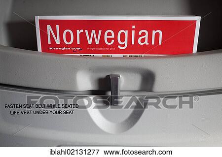 Logbook at a seat in an airplane of the Norwegian Airline View Large Photo Image Stock Photo - Logbook at a seat in an airplane of the Norwegian Airline. Fotosearch