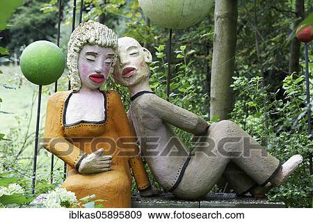 Lovers in the green, figures in the sculpture garden of the artist Jochen Bach, Plinzmühle, Plinz, Großkröbitz, Milda, Thuringia, Germany, Europe View Large Photo Image Stock Photo - Lovers in the green, figures in the sculpture garden of the artist Jochen Bach, Plinzmühle, Plinz, Großkröbitz, Milda, Thuringia, Germany, Europe. Fotosearch