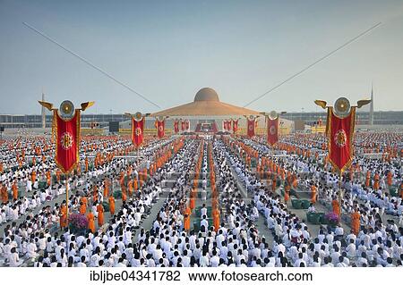 Makha Bucha Day, Magha Puja Day, Theravada Buddhist holiday, mass meeting with monks and religious people in Wat Phra Dhammakaya, Chedi Mahadhammakaya Cetiya, Khlong Luang District, Pathum Thani, Bangkok, Thailand, Asia *** IMPORTANT: Image must not... View Large Photo Image Stock Image - Makha Bucha Day, Magha Puja Day, Theravada Buddhist holiday, mass meeting with monks and religious people in Wat Phra Dhammakaya, Chedi Mahadhammakaya Cetiya, Khlong Luang District, Pathum Thani, Bangkok, Thailand, Asia *** IMPORTANT: Image must not.... Fotosearch