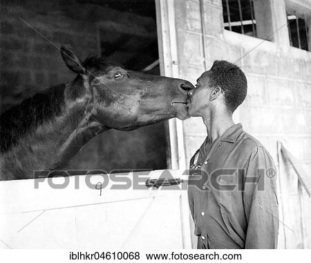 Stock Photo - Man kissing a horse, Mexico City, Mexico, Central America. Fotosearch