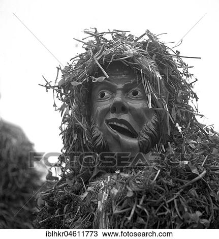 Masked man with drooping corner of his mouth and a suit of straw, carnival, around 1950, around Freiburg, Germany, Europe View Large Photo Image Stock Image - Masked man with drooping corner of his mouth and a suit of straw, carnival, around 1950, around Freiburg, Germany, Europe. Fotosearch