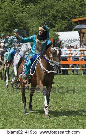 Members of the Royal Cavalry of Oman at the international horse show, Pferd International Munich, demonstrating traditional Omani Riding, Munich, Bavaria, Germany, Europe View Large Photo Image Stock Photography - Members of the Royal Cavalry of Oman at the international horse show, Pferd International Munich, demonstrating traditional Omani Riding, Munich, Bavaria, Germany, Europe. Fotosearch