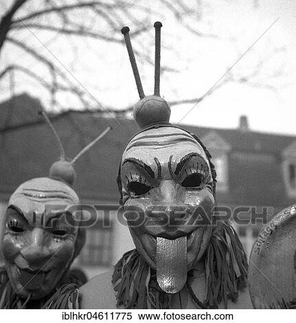 Men with mask stick their tongues out, carnival, around 1950, Freiburg, Germany, Europe View Large Photo Image Stock Photography - Men with mask stick their tongues out, carnival, around 1950, Freiburg, Germany, Europe. Fotosearch