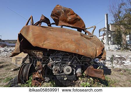 Minibus car wreck on a construction site, rusted, deformed, Düsseldorf, North Rhine-Westphalia, Germany, Europe View Large Photo Image Stock Image - Minibus car wreck on a construction site, rusted, deformed, Düsseldorf, North Rhine-Westphalia, Germany, Europe. Fotosearch