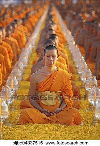 Monks sitting in a row meditating, Wat Phra Dhammakaya Temple, Khlong Luang District, Pathum Thani, Bangkok, Thailand, Asia *** IMPORTANT: The images may be used only in the positive sense of the Dhammakaya temple *** View Large Photo Image Stock Photography - Monks sitting in a row meditating, Wat Phra Dhammakaya Temple, Khlong Luang District, Pathum Thani, Bangkok, Thailand, Asia *** IMPORTANT: The images may be used only in the positive sense of the Dhammakaya temple ***. Fotosearch
