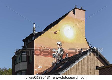 Mural See-Watch by Klaus Klinger, boy fishing paper boats, theme refugee rescue in the Mediterranean, Düsseldorf, North Rhine-Westphalia, Germany, Europe View Large Photo Image Stock Image - Mural See-Watch by Klaus Klinger, boy fishing paper boats, theme refugee rescue in the Mediterranean, Düsseldorf, North Rhine-Westphalia, Germany, Europe. Fotosearch