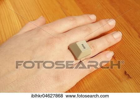 Stock Photo - Needy, Hand with Help Ring from the computer keyboard, Germany, Europe. Fotosearch