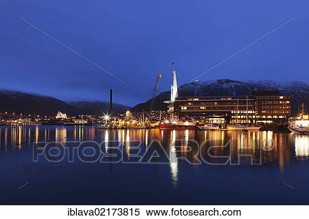 Night view of part of the harbour area of Tromsø, Tromso, showing the Ishavshotel and Tromsdalen Church, Arctic Cathedral or Ishavskatredalen, Norway, Europe View Large Photo Image Stock Photography - Night view of part of the harbour area of Tromsø, Tromso, showing the Ishavshotel and Tromsdalen Church, Arctic Cathedral or Ishavskatredalen, Norway, Europe. Fotosearch