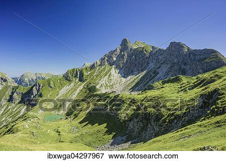 Oberer Gaisalpsee, dahinter das Nebelhorn, Allgauer Alpen, Allgau, Bayern, Deutschland, Europa View Large Photo Image Stock Photo - Oberer Gaisalpsee, dahinter das Nebelhorn, Allgauer Alpen, Allgau, Bayern, Deutschland, Europa. Fotosearch