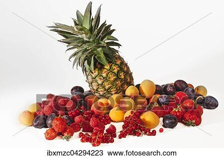 Stock Image - Obst, Stillleben mit verschiedenen Fruchten auf Weiss. Fotosearch