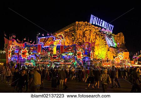 Oktoberfest, Wiesn, amusement rides, Hoellenblitz ghost train at night, Munich, Bavaria, Germany, Europe View Large Photo Image Stock Image - Oktoberfest, Wiesn, amusement rides, Hoellenblitz ghost train at night, Munich, Bavaria, Germany, Europe. Fotosearch