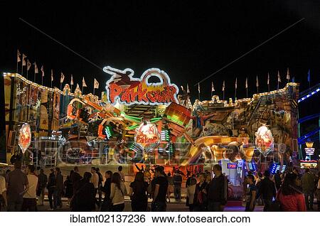 Oktoberfest, Wiesn, Parkour, a rotating amusement ride at night, Munich, Bavaria, Germany, Europe View Large Photo Image Stock Photograph - Oktoberfest, Wiesn, Parkour, a rotating amusement ride at night, Munich, Bavaria, Germany, Europe. Fotosearch