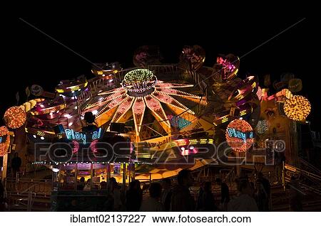 Oktoberfest, Wiesn, Playball, a rotating amusement ride at night, Munich, Bavaria, Germany, Europe View Large Photo Image Stock Photo - Oktoberfest, Wiesn, Playball, a rotating amusement ride at night, Munich, Bavaria, Germany, Europe. Fotosearch