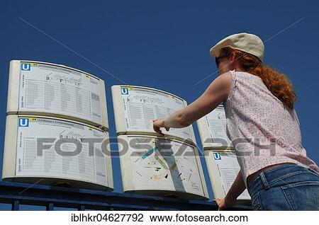 Orientation, woman with timetable metro, Germany, Europe View Large Photo Image Stock Image - Orientation, woman with timetable metro, Germany, Europe. Fotosearch