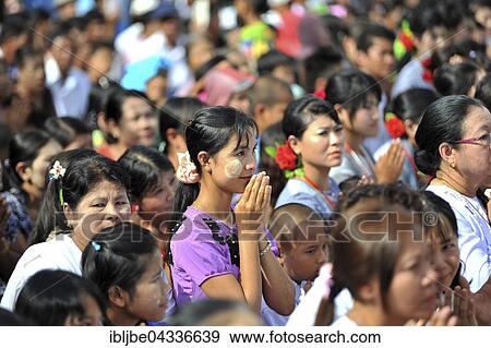 Praying believers in the Azarni Road, Bigboon Festival, day of meditation, pilgrims' procession, Dhammakaya Foundation, Dawei, Tanintharyi Region, Myanmar, Asia *** IMPORTANT: Image may not be used in a negative context with the Dhammakaya temple *** View Large Photo Image Stock Photo - Praying believers in the Azarni Road, Bigboon Festival, day of meditation, pilgrims' procession, Dhammakaya Foundation, Dawei, Tanintharyi Region, Myanmar, Asia *** IMPORTANT: Image may not be used in a negative context with the Dhammakaya temple ***. Fotosearch
