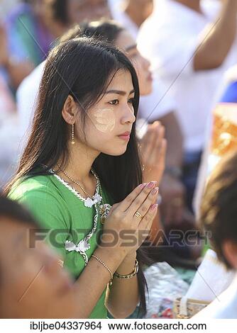 Praying woman at the Bigboon pilgrims' procession, meditation day of the Dhammakaya Foundation, Dawei, Tanintharyi Region, Myanmar, Asia *** IMPORTANT: Image may not be used in a negative context with the Dhammakaya temple *** View Large Photo Image Picture - Praying woman at the Bigboon pilgrims' procession, meditation day of the Dhammakaya Foundation, Dawei, Tanintharyi Region, Myanmar, Asia *** IMPORTANT: Image may not be used in a negative context with the Dhammakaya temple ***. Fotosearch