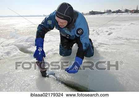 Preparations for subglacial diving, ice diving in the frozen Black Sea, a rare phenomenon which last occured in 1977, Odessa, Ukraine, Eastern Europe, Europe View Large Photo Image Picture - Preparations for subglacial diving, ice diving in the frozen Black Sea, a rare phenomenon which last occured in 1977, Odessa, Ukraine, Eastern Europe, Europe. Fotosearch