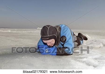 Preparations for subglacial diving, ice diving in the frozen Black Sea, a rare phenomenon which last occured in 1977, Odessa, Ukraine, Eastern Europe, Europe View Large Photo Image Stock Image - Preparations for subglacial diving, ice diving in the frozen Black Sea, a rare phenomenon which last occured in 1977, Odessa, Ukraine, Eastern Europe, Europe. Fotosearch