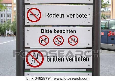 Prohibition signs, banned are tobogganing, dogs, ball games, cycling, barbecues, Potsdamer Platz, Berlin, Germany, Europe View Large Photo Image Picture - Prohibition signs, banned are tobogganing, dogs, ball games, cycling, barbecues, Potsdamer Platz, Berlin, Germany, Europe. Fotosearch