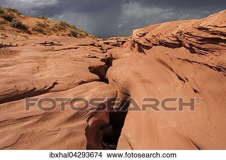 Sandsteinformation, Einstieg in den Lower Antelope Canyon, Slot Canyon, hinten Gewitterwolken, Page, Arizona, USA, Nordamerika View Large Photo Image Picture - Sandsteinformation, Einstieg in den Lower Antelope Canyon, Slot Canyon, hinten Gewitterwolken, Page, Arizona, USA, Nordamerika. Fotosearch