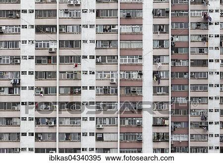 Stock Photography - Sky scraper front with external air conditioners, Ping Shek Estate, housing development from 1970, Kwun Tong District, Kowloon, Hong Kong, China, Asia. Fotosearch
